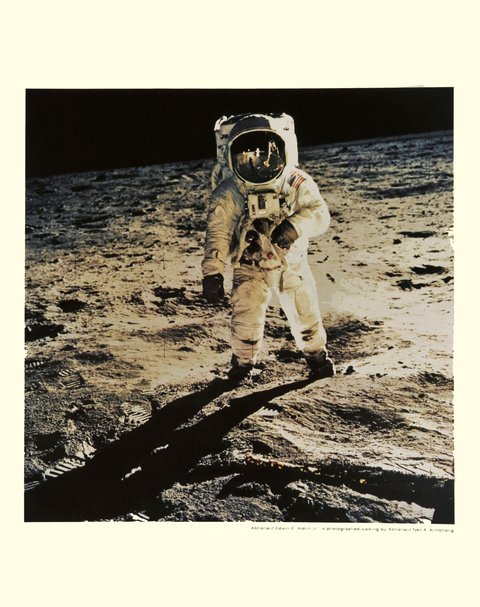 Apollo XI, Astronaut Edwin Aldrin Jr. is photographed walking by astronaut Neil A. Armstrong
